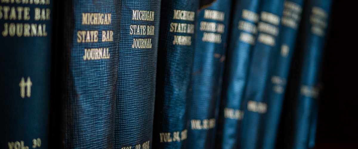 Scientist reviewing research data at a university desk